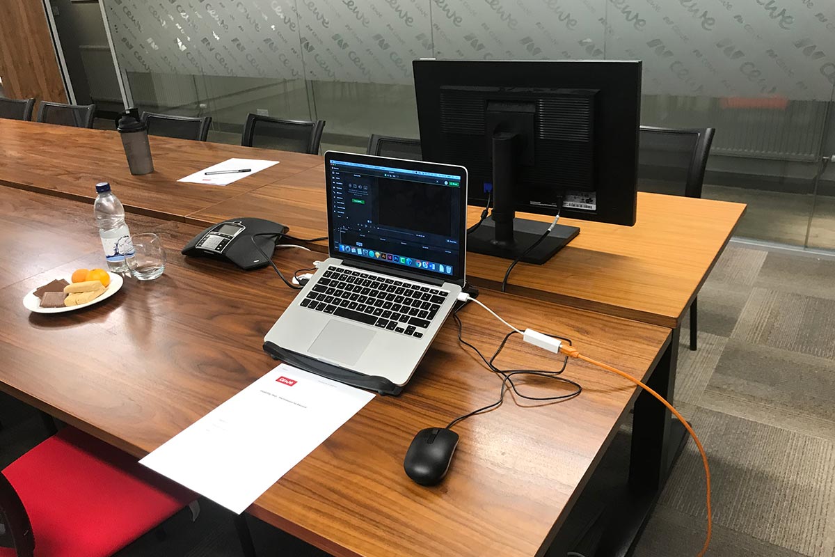 Two computers set up in a room for usability testing